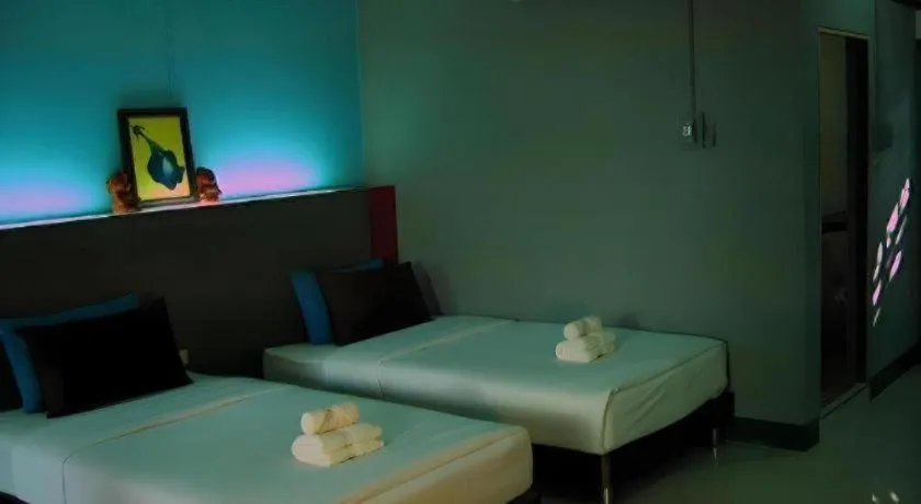 Bed in Ruen Kaew Resort