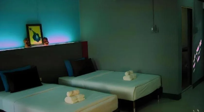 Bed in Ruen Kaew Resort