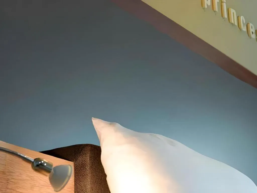 Bed in Atikarn Princess Hotel & Resort