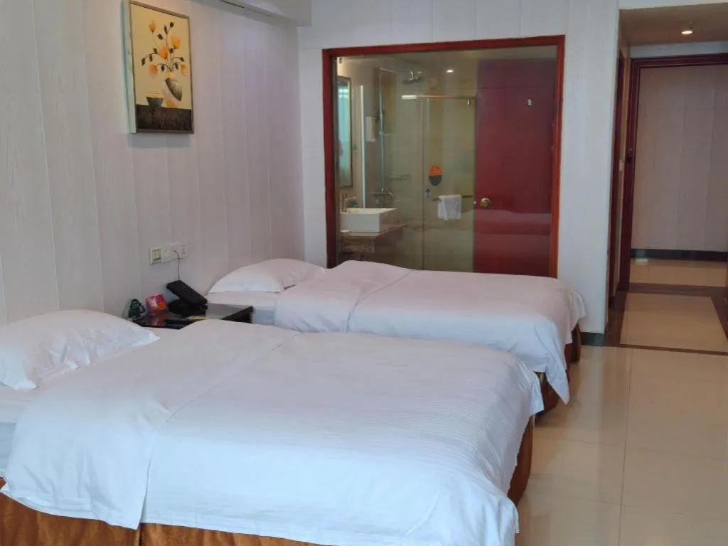Bed in GreenTree Inn Shenzhen Kengzi Town Express Hotel
