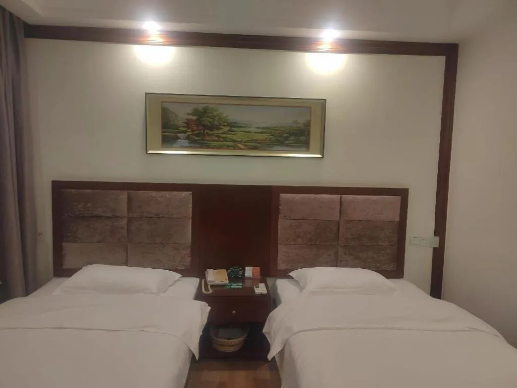 Bed in GreenTree Inn Shenzhen Kengzi Town Express Hotel