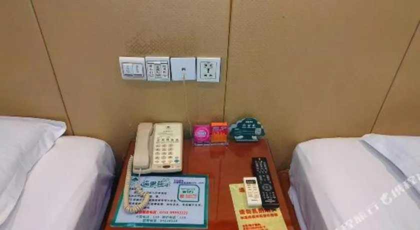 Bed in GreenTree Inn Shenzhen Kengzi Town Express Hotel