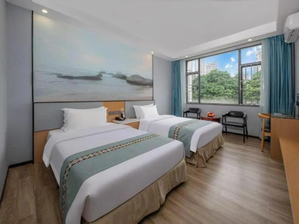 Bed in Zhenxing Hotel