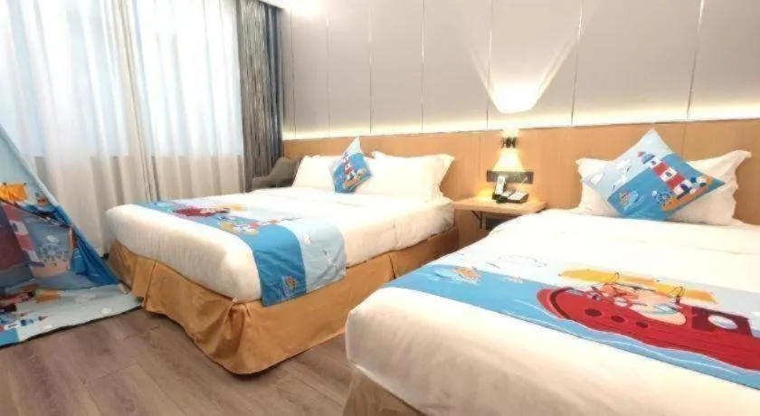 Bed in Zhenxing Hotel