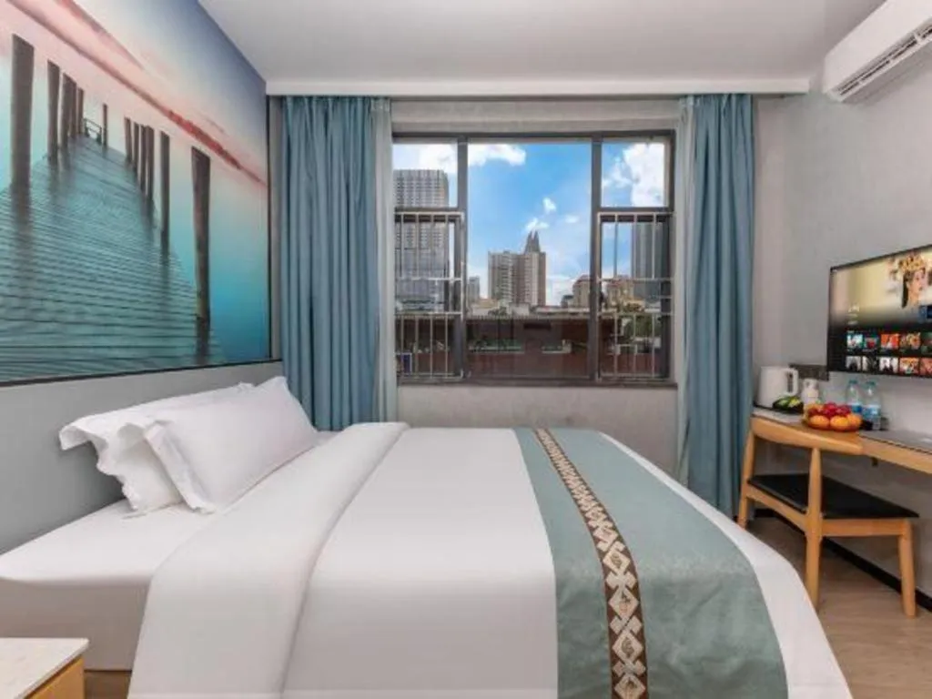 Bed in Zhenxing Hotel