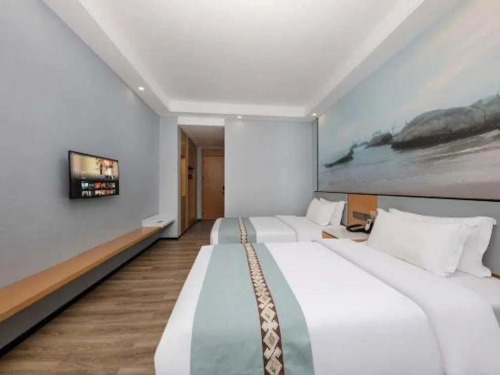 Bed in Zhenxing Hotel