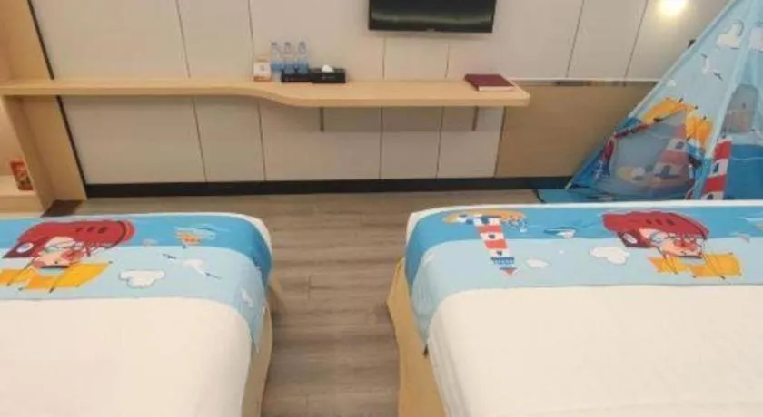 Bed in Zhenxing Hotel