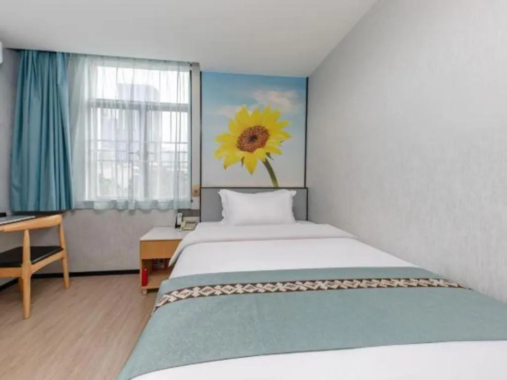 Bed in Zhenxing Hotel