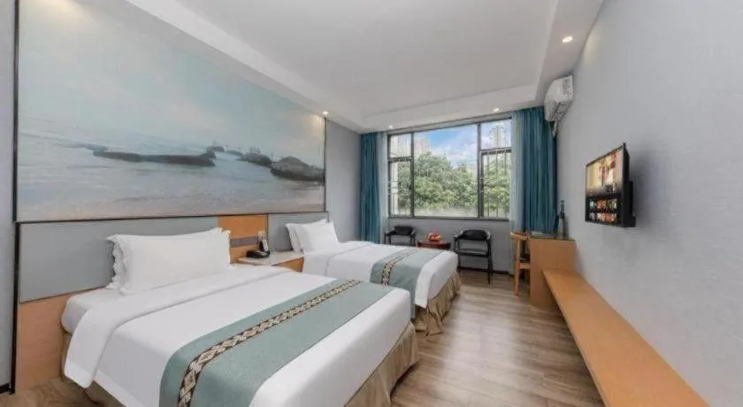 Bed in Zhenxing Hotel