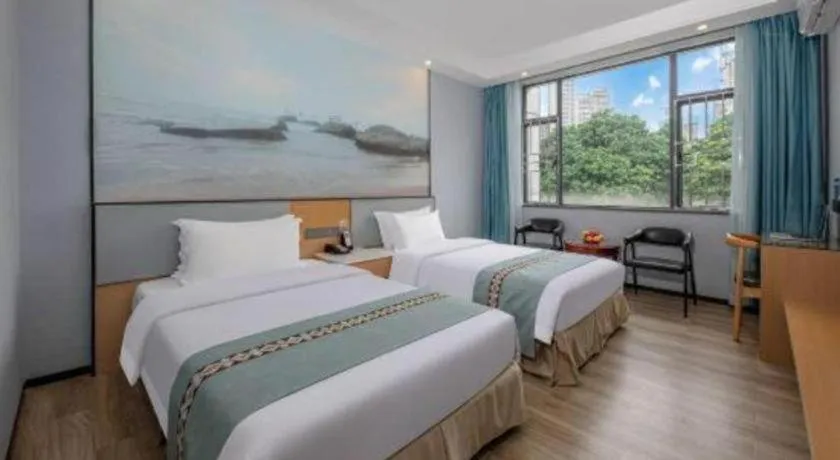 Bed in Zhenxing Hotel