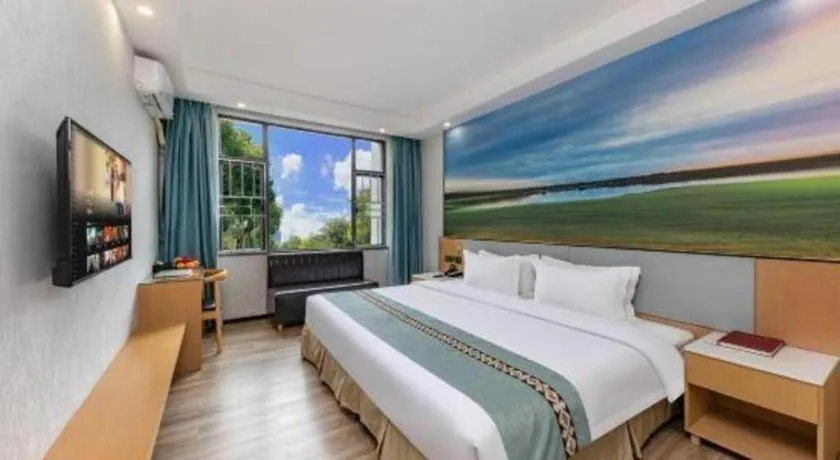 Bed in Zhenxing Hotel