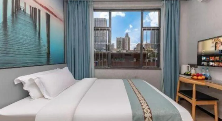 Bed in Zhenxing Hotel