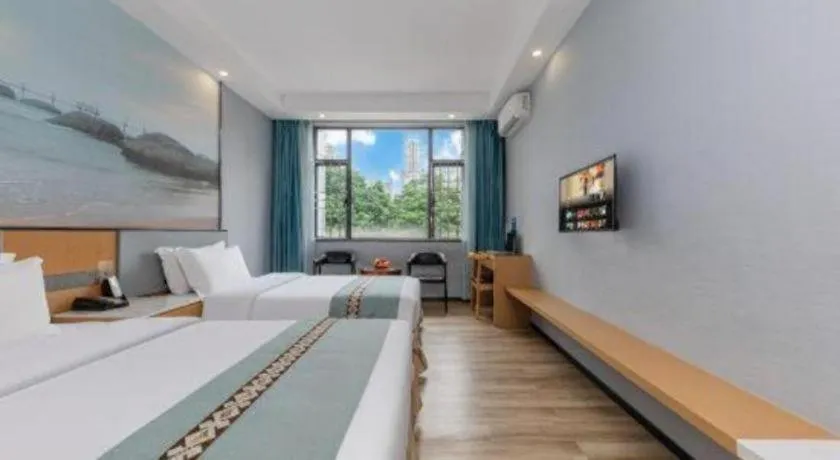 Bed in Zhenxing Hotel