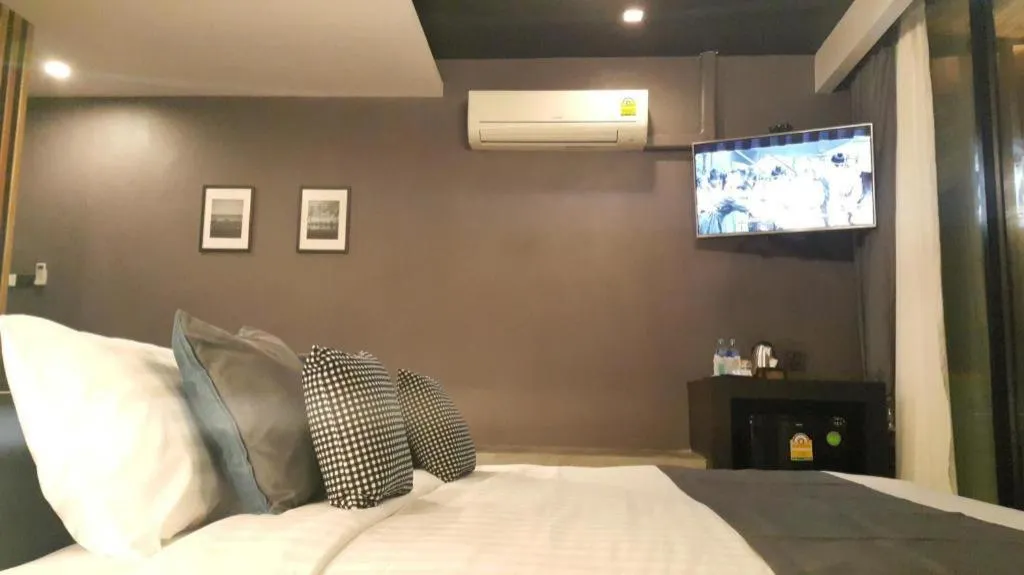 Bed in Baan Chao Mai Beach House