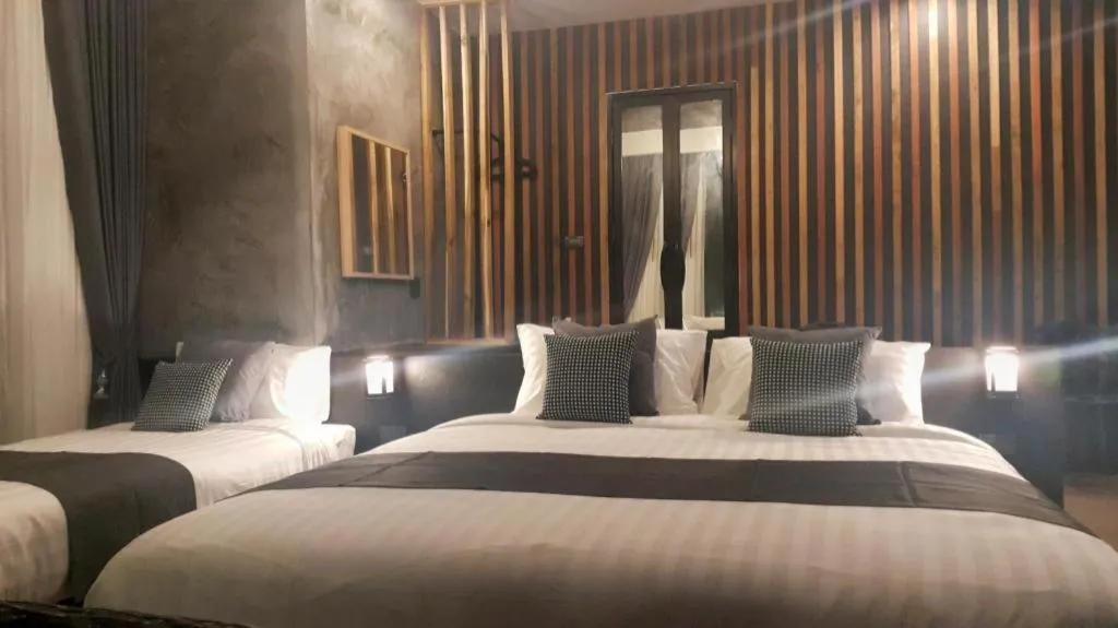 Bed in Baan Chao Mai Beach House