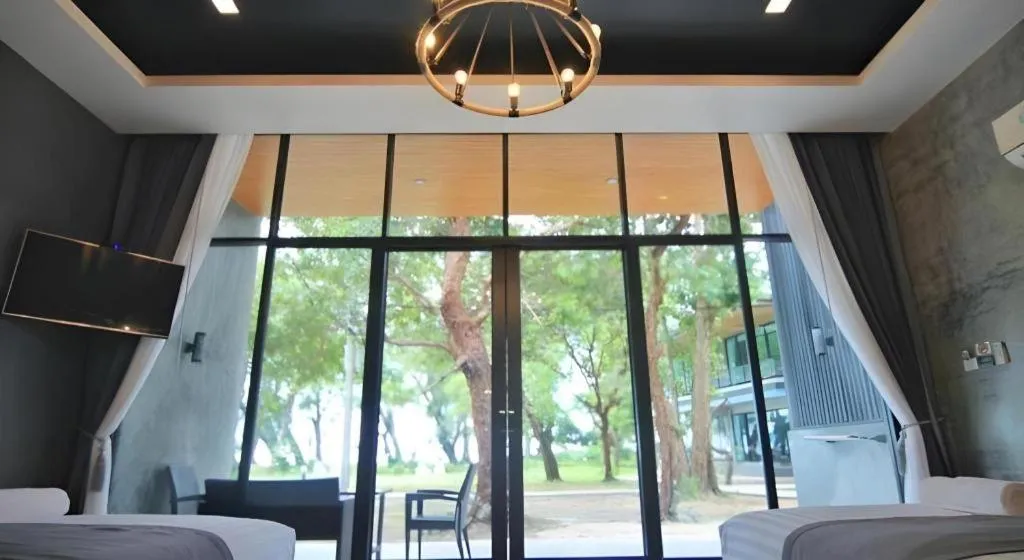 Bed in Baan Chao Mai Beach House