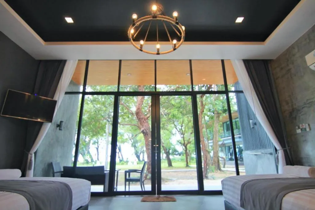 Bed in Baan Chao Mai Beach House