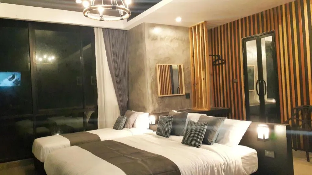 Bed in Baan Chao Mai Beach House