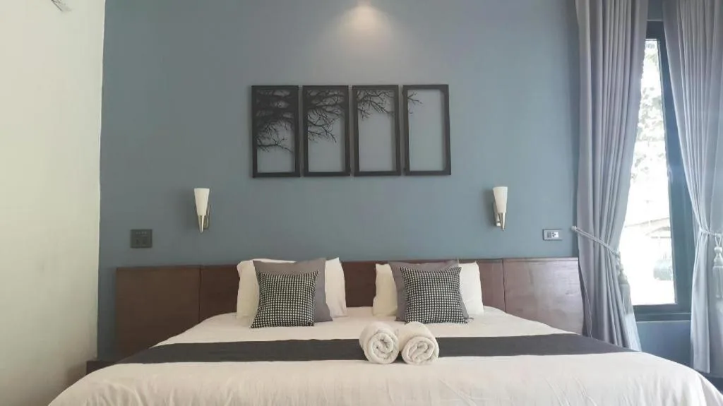 Bed in Baan Chao Mai Beach House