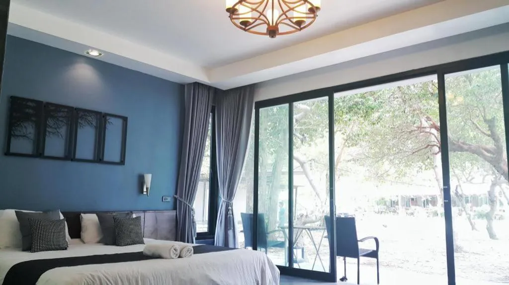 Bed in Baan Chao Mai Beach House