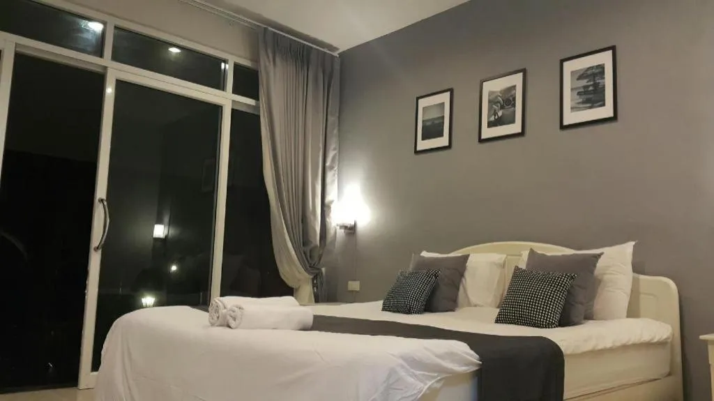 Bed in Baan Chao Mai Beach House