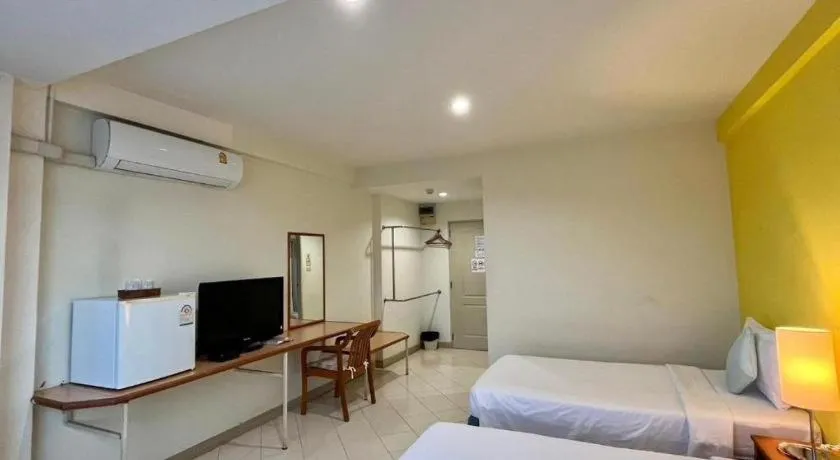 Bed in The Majestic Sakon Nakhon Hotel