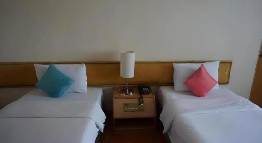 Bed in The Majestic Sakon Nakhon Hotel