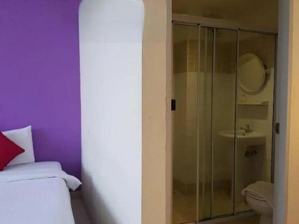 Bed in The Majestic Sakon Nakhon Hotel