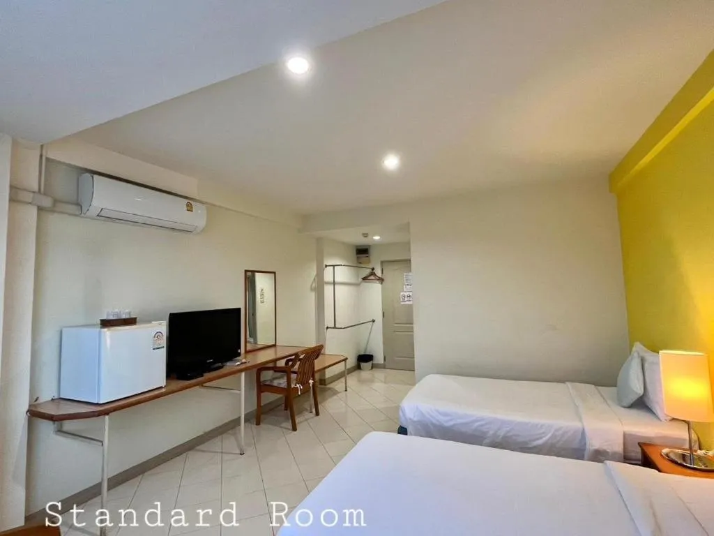 Bed in The Majestic Sakon Nakhon Hotel