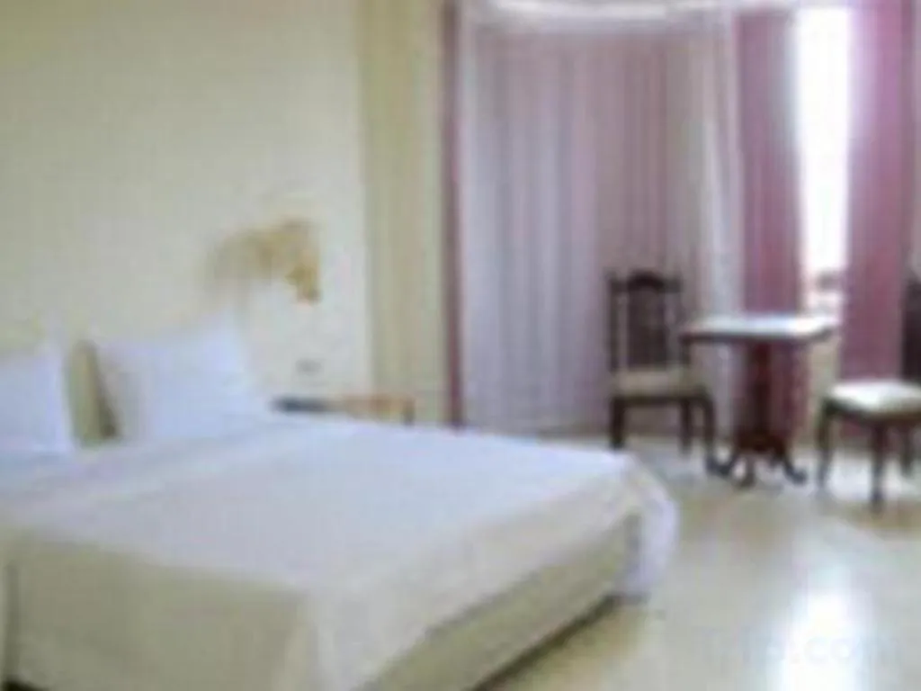 Bed in The Majestic Sakon Nakhon Hotel