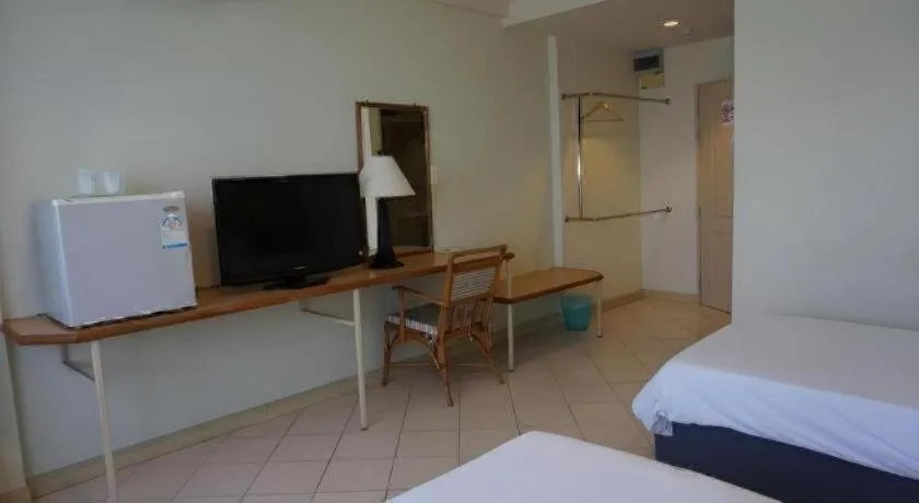 Bed in The Majestic Sakon Nakhon Hotel