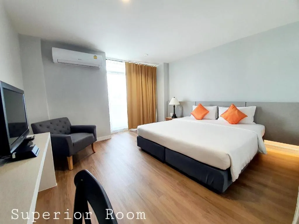 Bed in The Majestic Sakon Nakhon Hotel