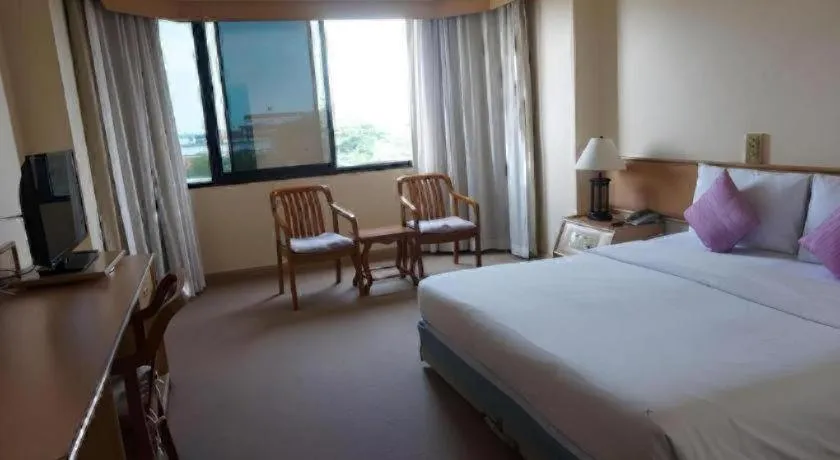 Bed in The Majestic Sakon Nakhon Hotel