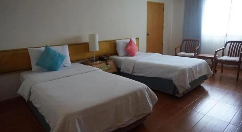 Bed in The Majestic Sakon Nakhon Hotel