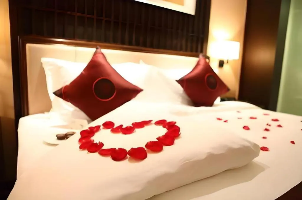 Bed in Xiang Yun Sha Garden Hotel