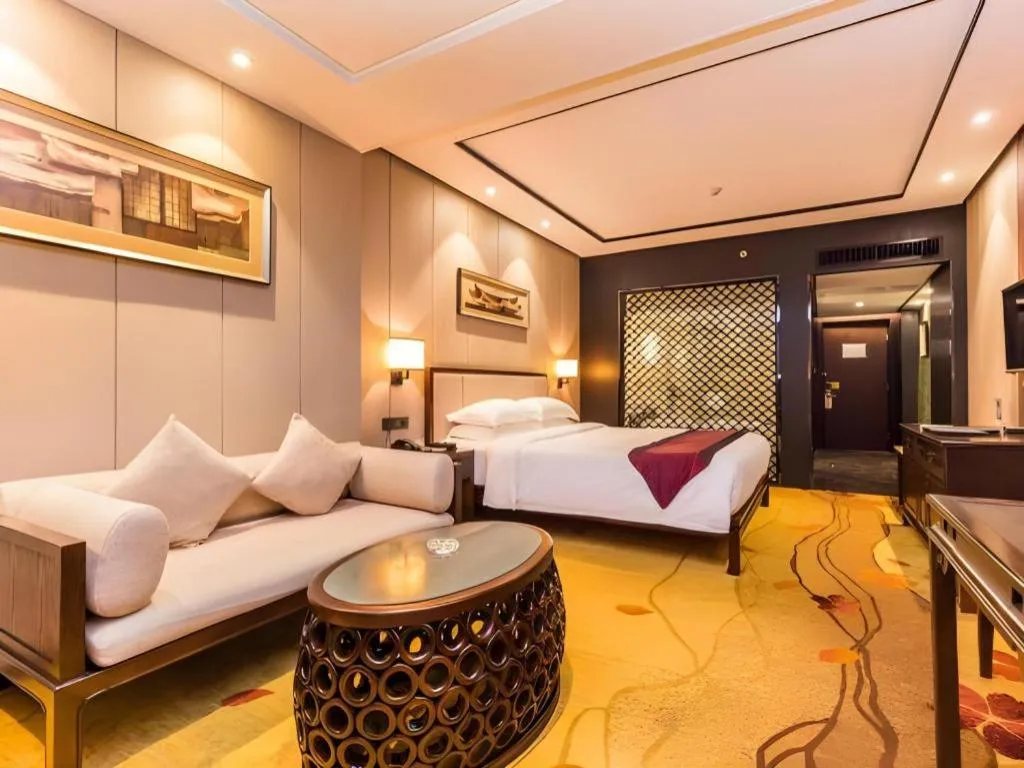 Bed in Xiang Yun Sha Garden Hotel