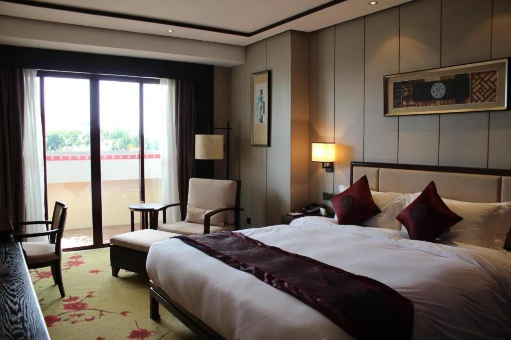 Bed in Xiang Yun Sha Garden Hotel