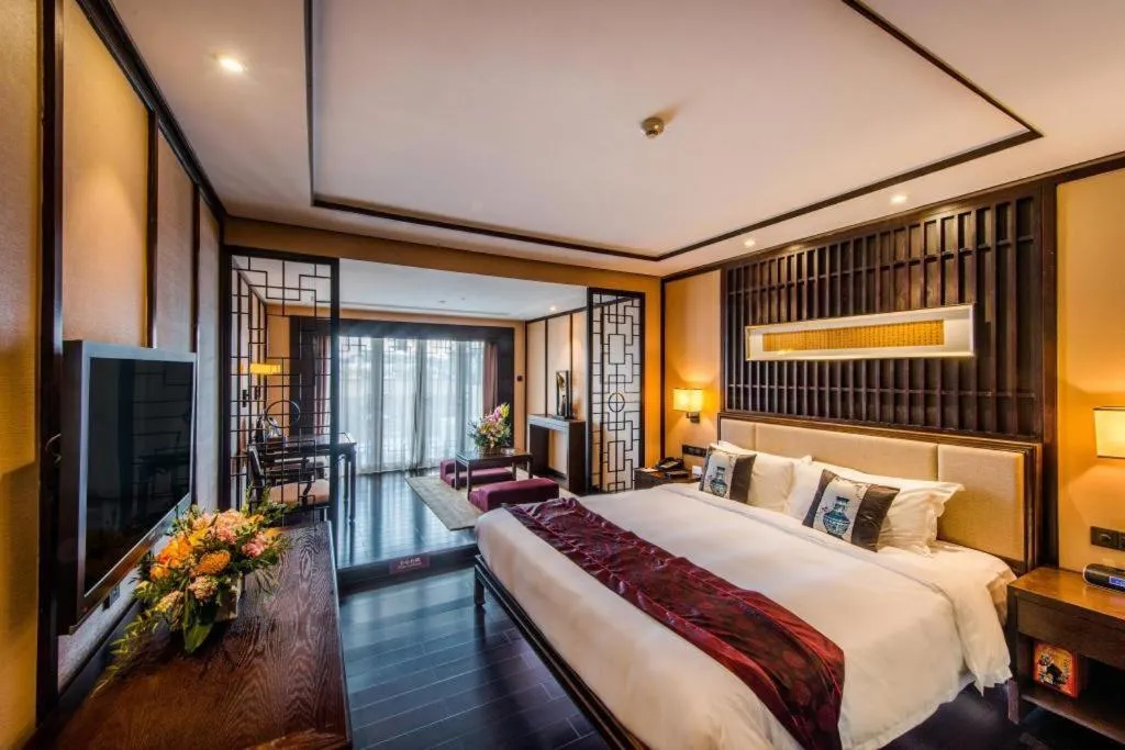 Bed in Xiang Yun Sha Garden Hotel