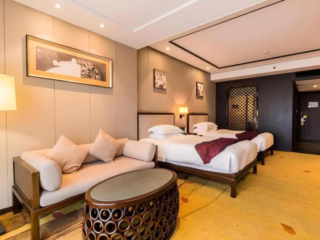 Bed in Xiang Yun Sha Garden Hotel