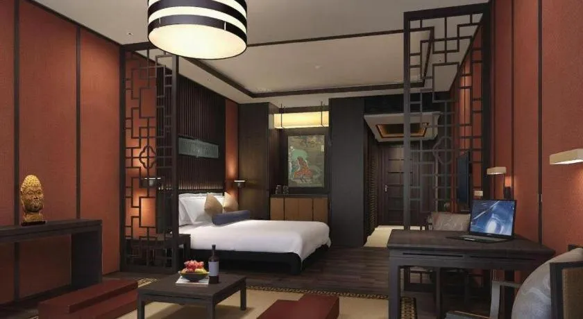 Bed in Xiang Yun Sha Garden Hotel