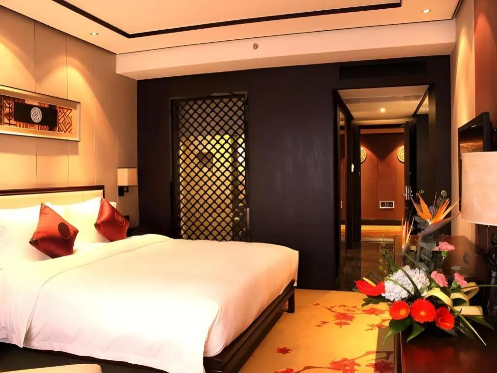 Bed in Xiang Yun Sha Garden Hotel