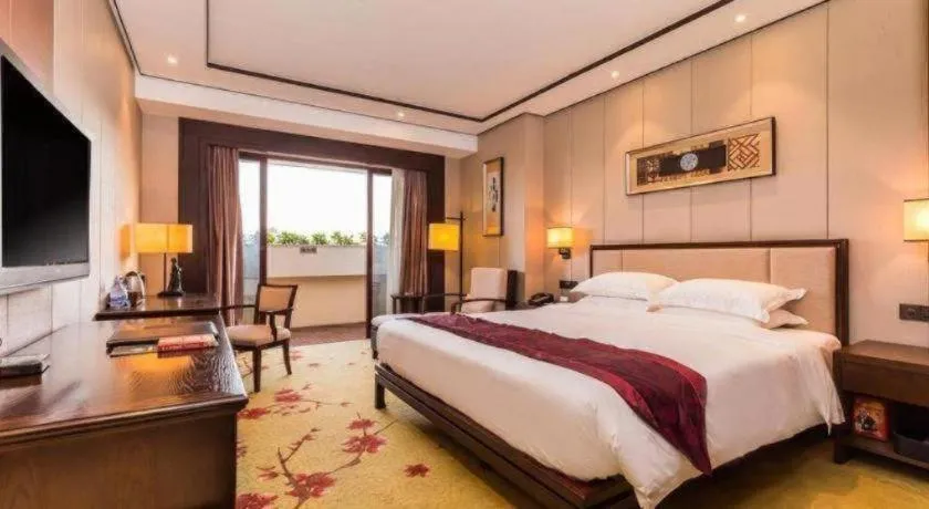Bed in Xiang Yun Sha Garden Hotel