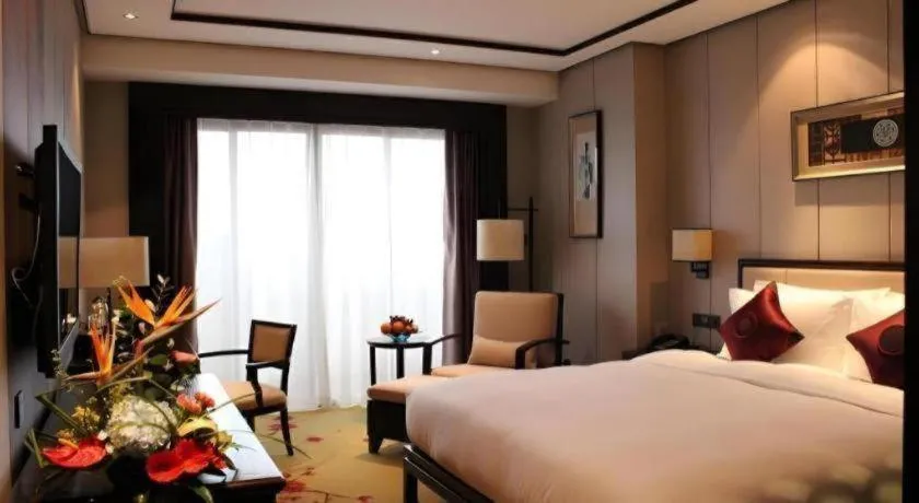 Bed in Xiang Yun Sha Garden Hotel