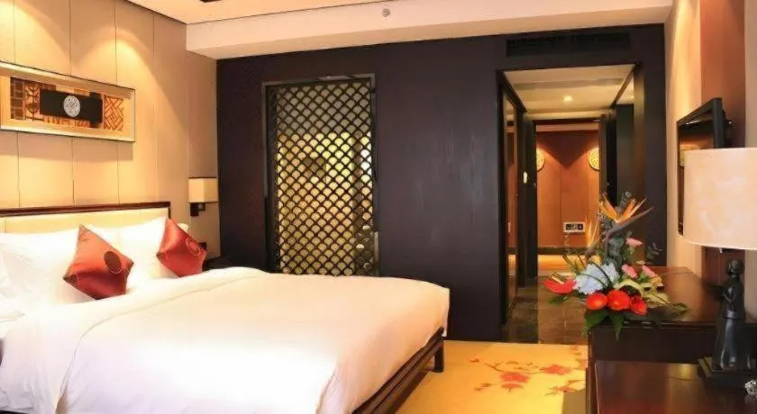 Bed in Xiang Yun Sha Garden Hotel