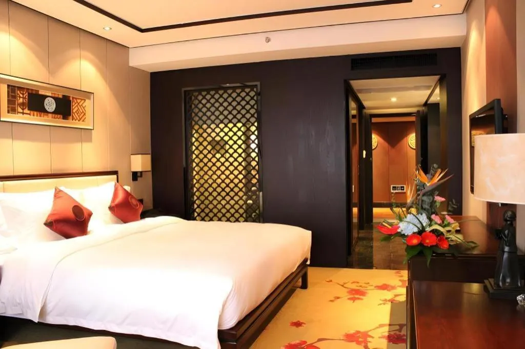 Bed in Xiang Yun Sha Garden Hotel