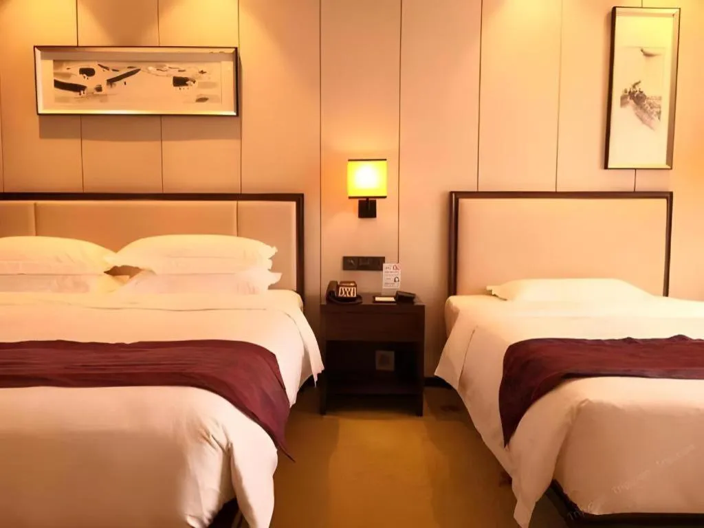 Bed in Xiang Yun Sha Garden Hotel