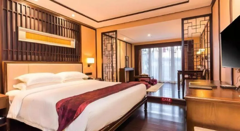 Bed in Xiang Yun Sha Garden Hotel