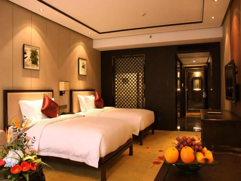 Bed in Xiang Yun Sha Garden Hotel