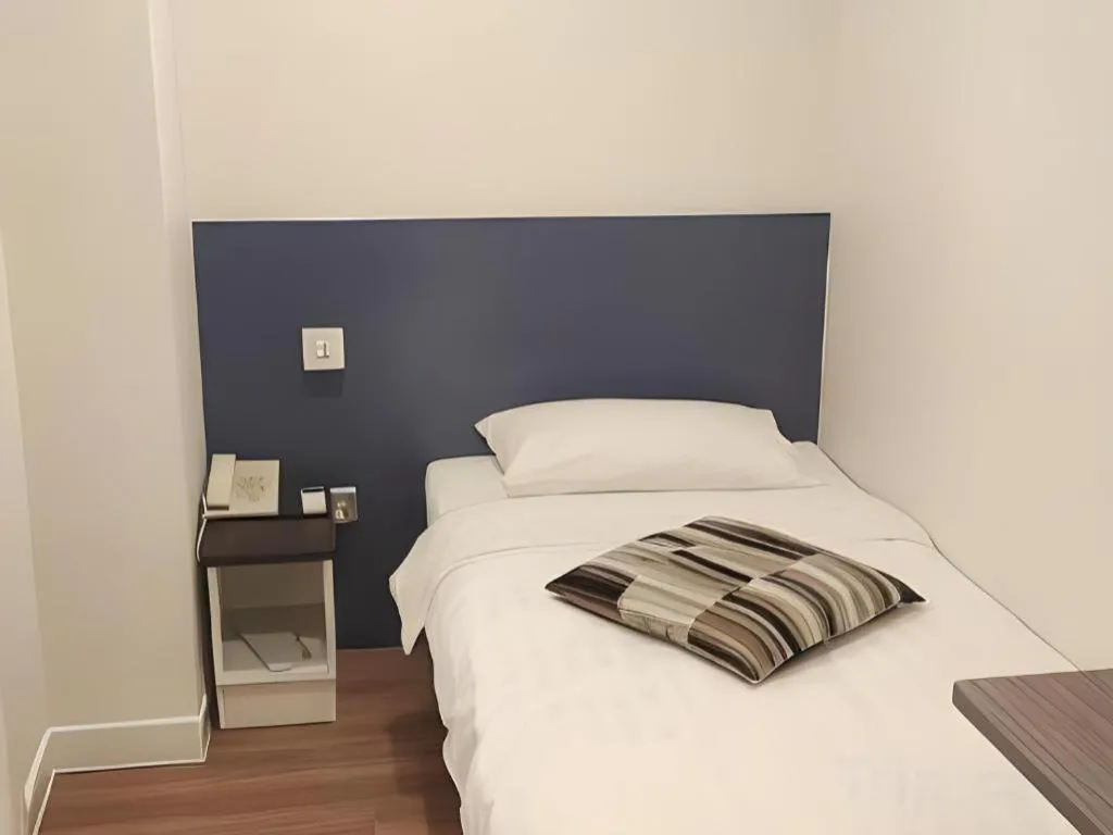 Bed in Goodrich Hotel