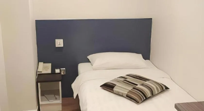 Bed in Goodrich Hotel